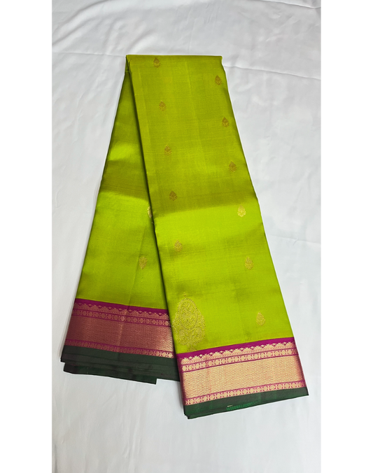Parrot Green Kanchipuram Silk Saree with Contrast Pink Border