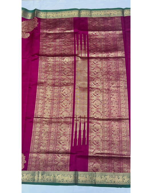 Magenta pink handloom silk cotton saree with green contrast border