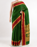 Bottle green handloom silk cotton saree with contrast gap border