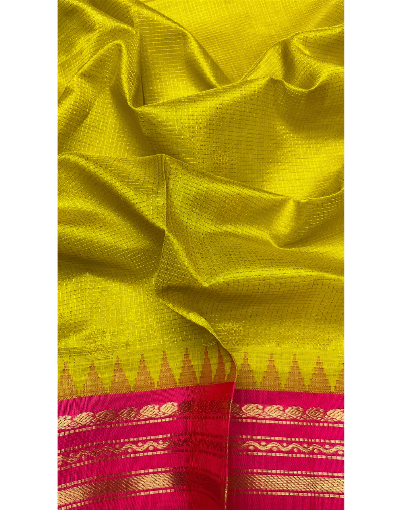Lime yellow handloom silk cotton saree with bright pink contrast border
