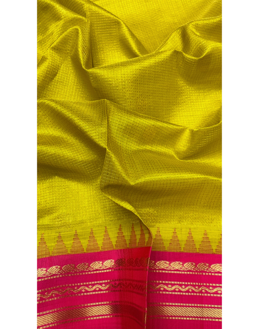 Lime yellow handloom silk cotton saree with bright pink contrast border