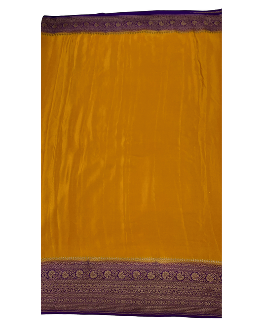 Mustard yellow pure Banarasi Khaddi crepe silk saree with contrast purple border
