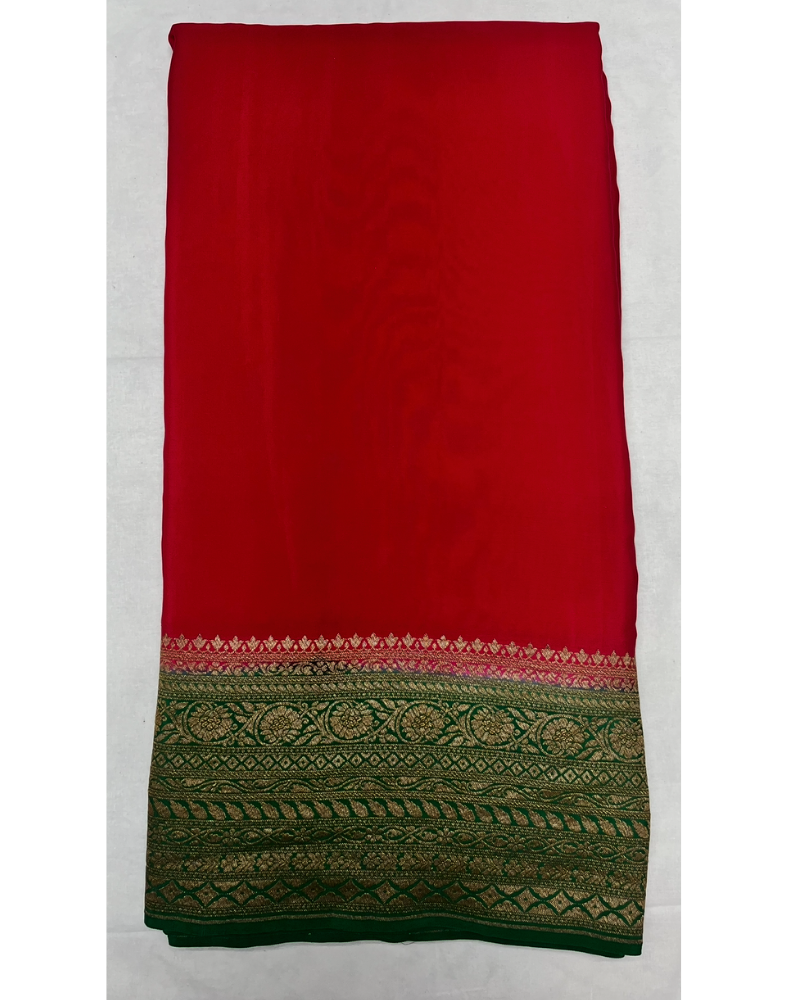 Chilli red pure Banarasi Khaddi crepe silk saree with contrast forest green border