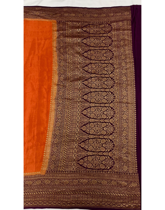 Rust orange pure Banarasi Khaddi crepe silk saree with contrast wine border