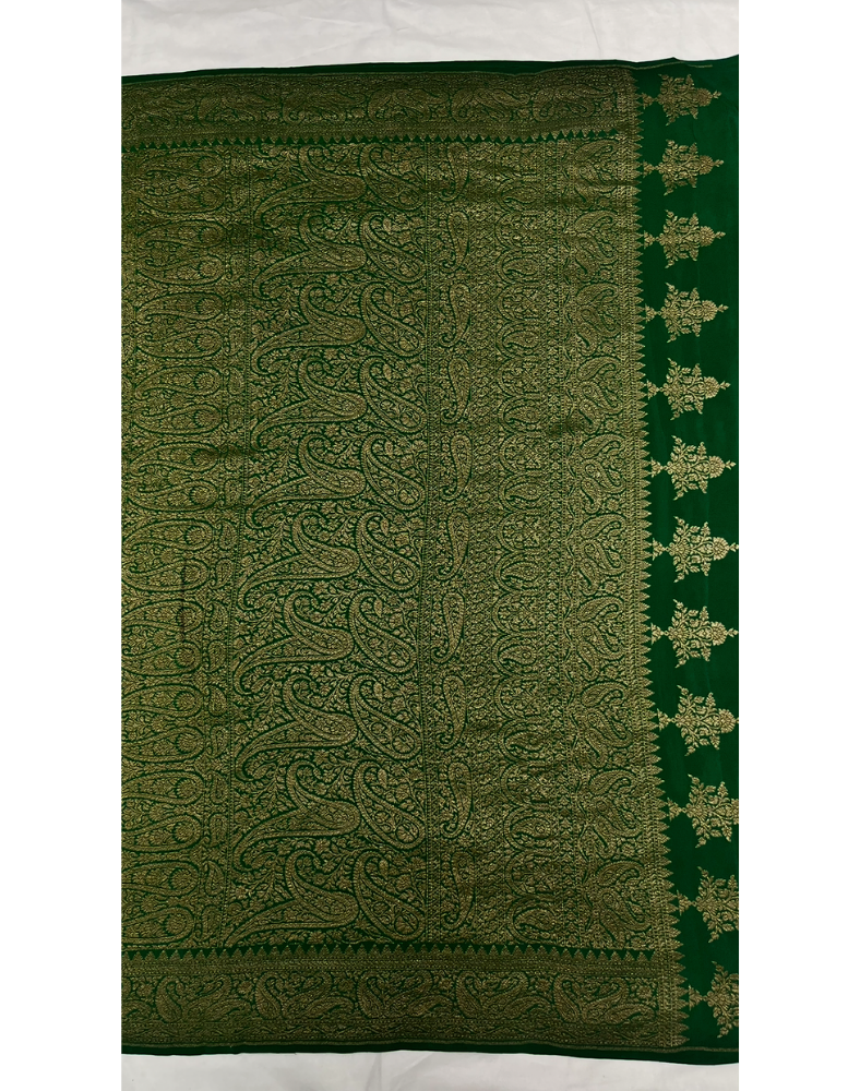 Black pure Banarasi Khaddi crepe silk saree with forest green border