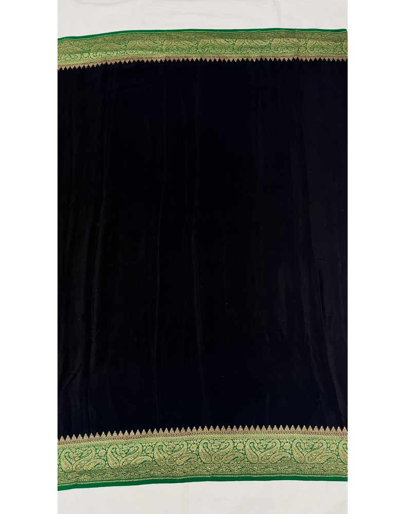 Black pure Banarasi Khaddi crepe silk saree with forest green border