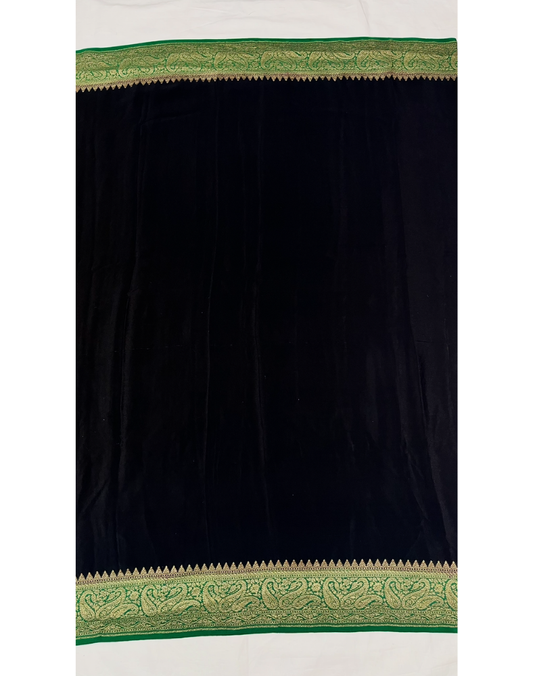 Black pure Banarasi Khaddi crepe silk saree with forest green border