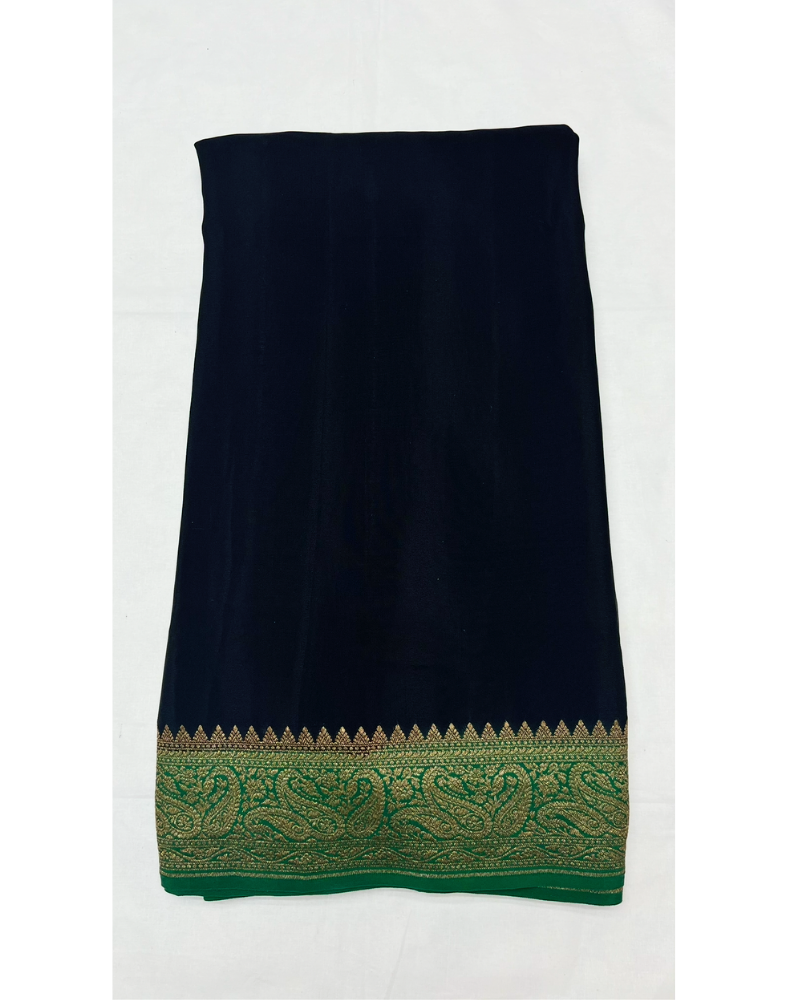 Black pure Banarasi Khaddi crepe silk saree with forest green border