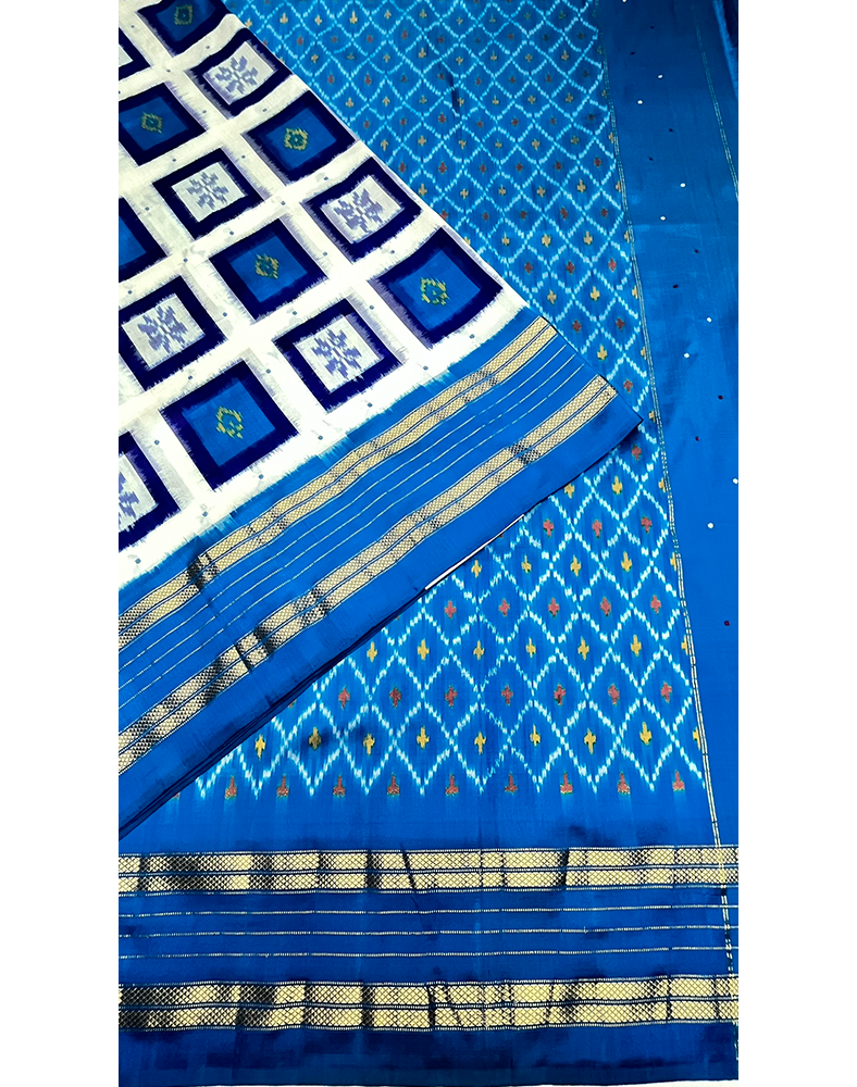 White Handwoven Ikat Silk Saree with Contrast Ocean Blue Kanchi Border
