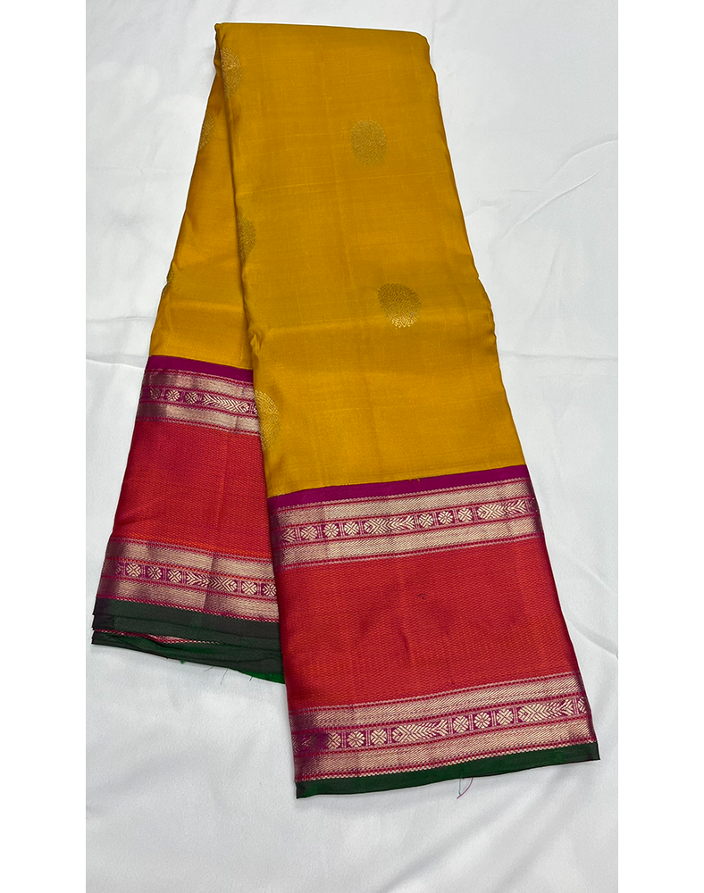Mustard Yellow Kanchipuram Silk Saree with Contrast Orange and Pink Border