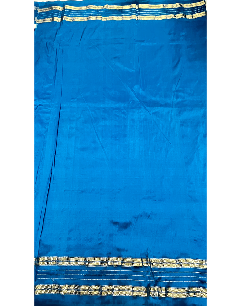 White Handwoven Ikat Silk Saree with Contrast Ocean Blue Kanchi Border