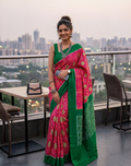 Magenta Pink Handwoven Ikat Silk Saree with Contrast Green Border